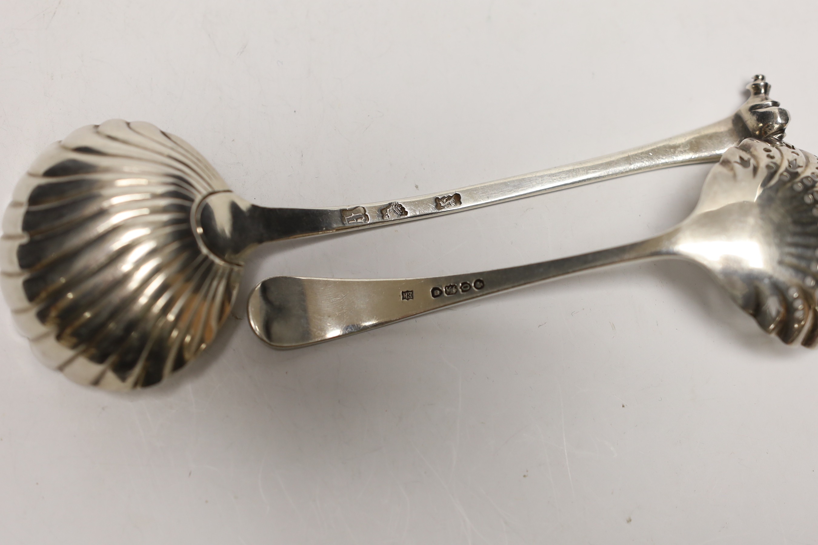 A George II silver Onslow pattern sauce ladle, London 1741, 16.7cm and a Victorian sifter spoon, Edward Hutton, London, 1889, 71 grams.